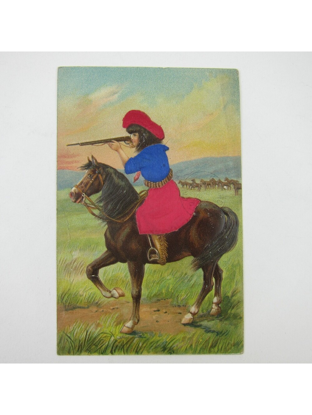 Postcard Western Cowgirl Woman on Horse Red Hat Skirt Rifle Aim Embossed Antique